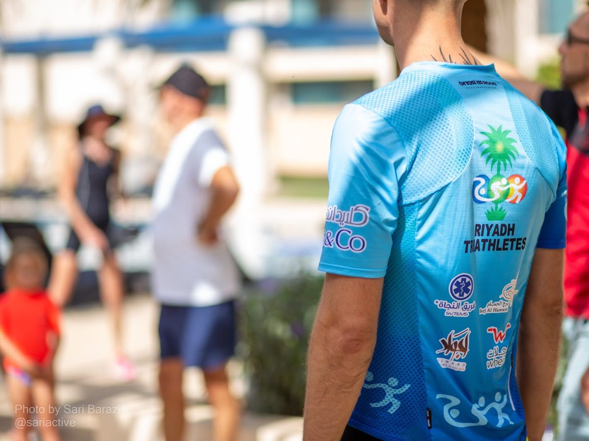 Riyadh Triathletes club jersey at an event